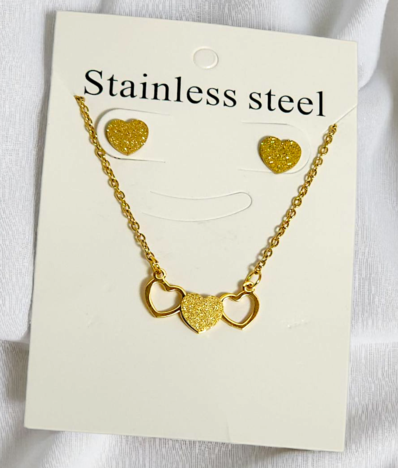 Golden three-heart jewelry set نیمست طلایی سه قلب